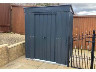 A 6x4 Globel Pent in Anthracite Grey on a Foundation Kit